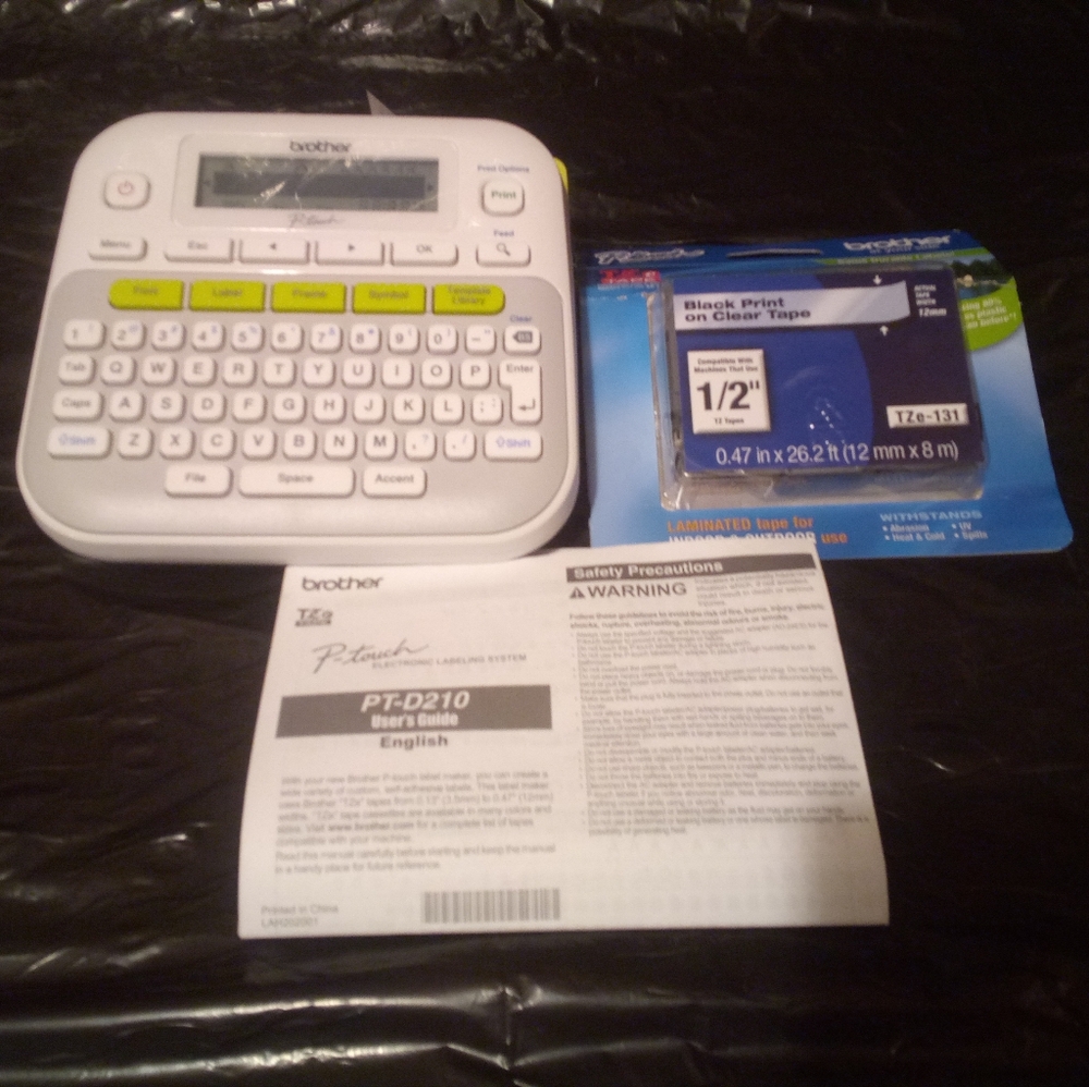 Brother PT-D210 Label Maker - White and Black With Extra Thing Of Label Tape